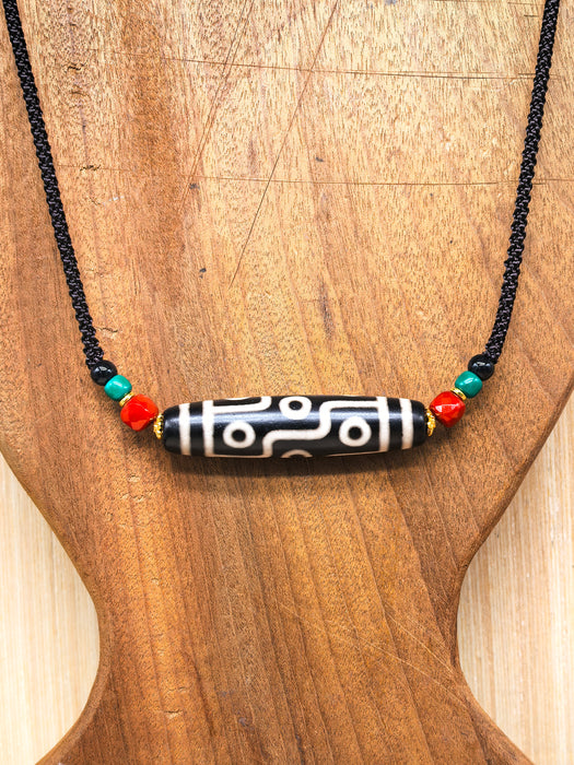 Dzi tibetano a nove occhi