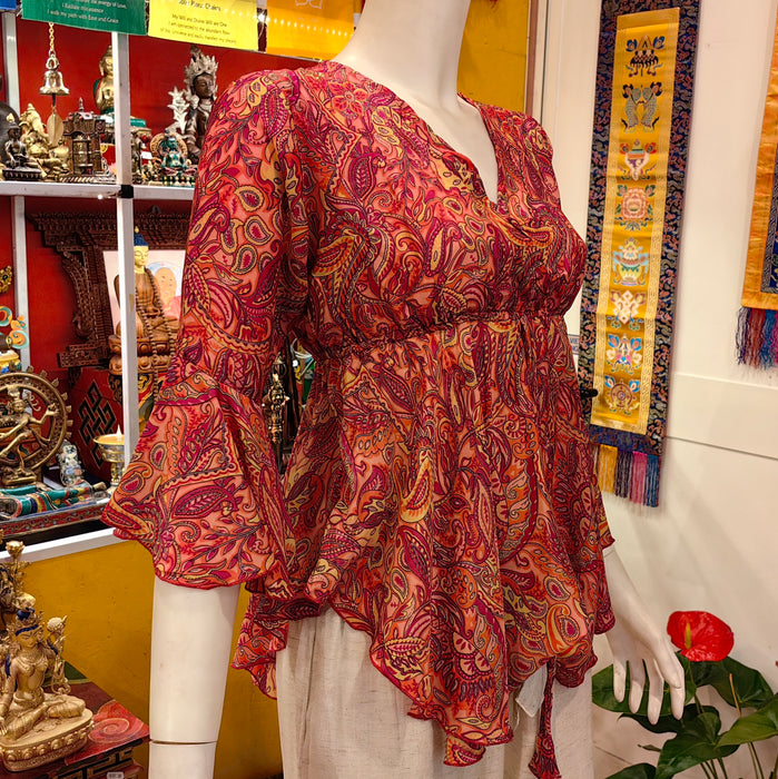 Blusa con con maniche al gomito