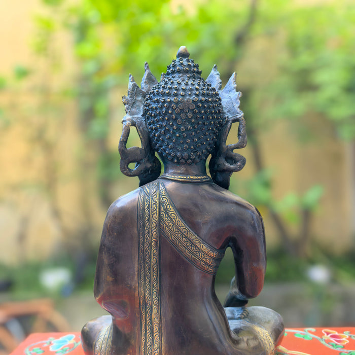 Buddha Shakyamuni incoronato in bronzo