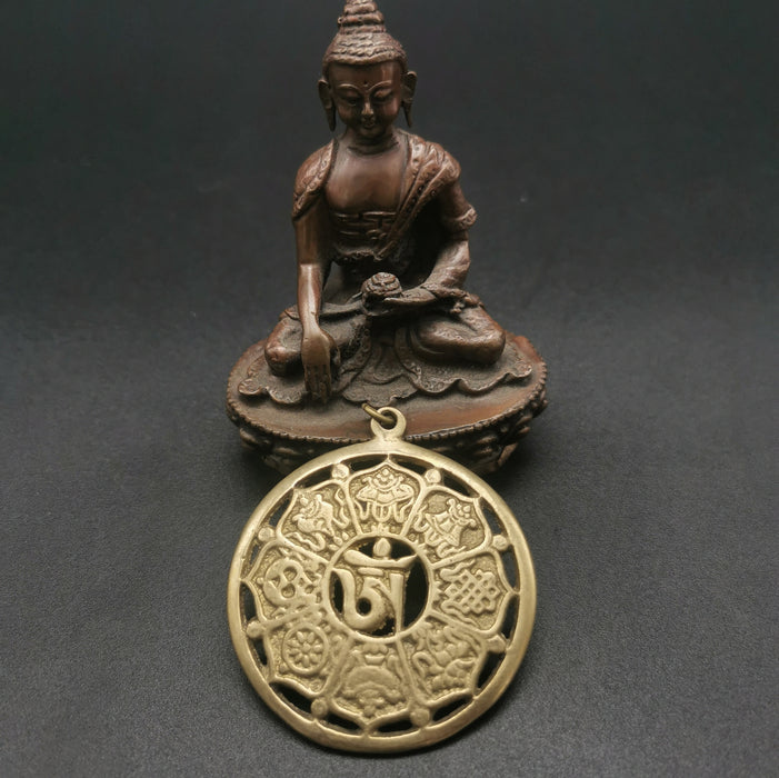 ciondolo om e tashi dagyal